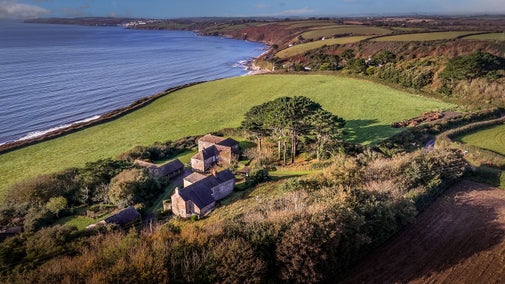 The Gwendra cottages (Gwendra Wartha, Gwendra Granary, Gwendra Dairy Cottage, Mowhay and Hayloft) overlooking the sea, Cornwall